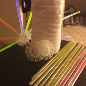 Glow sticks glitter in paint circles